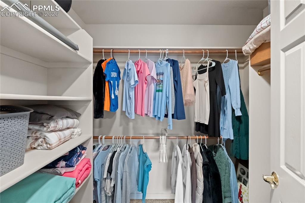 Image 28 of 40: Third bedroom walk in closet.