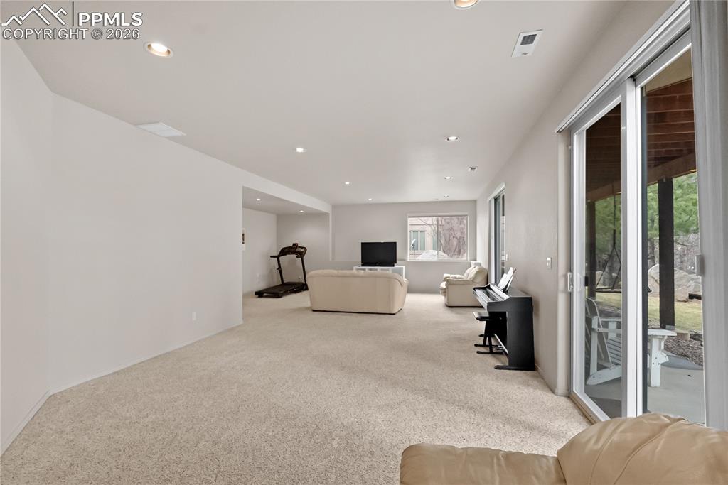 Image 29 of 40: Basement family room.