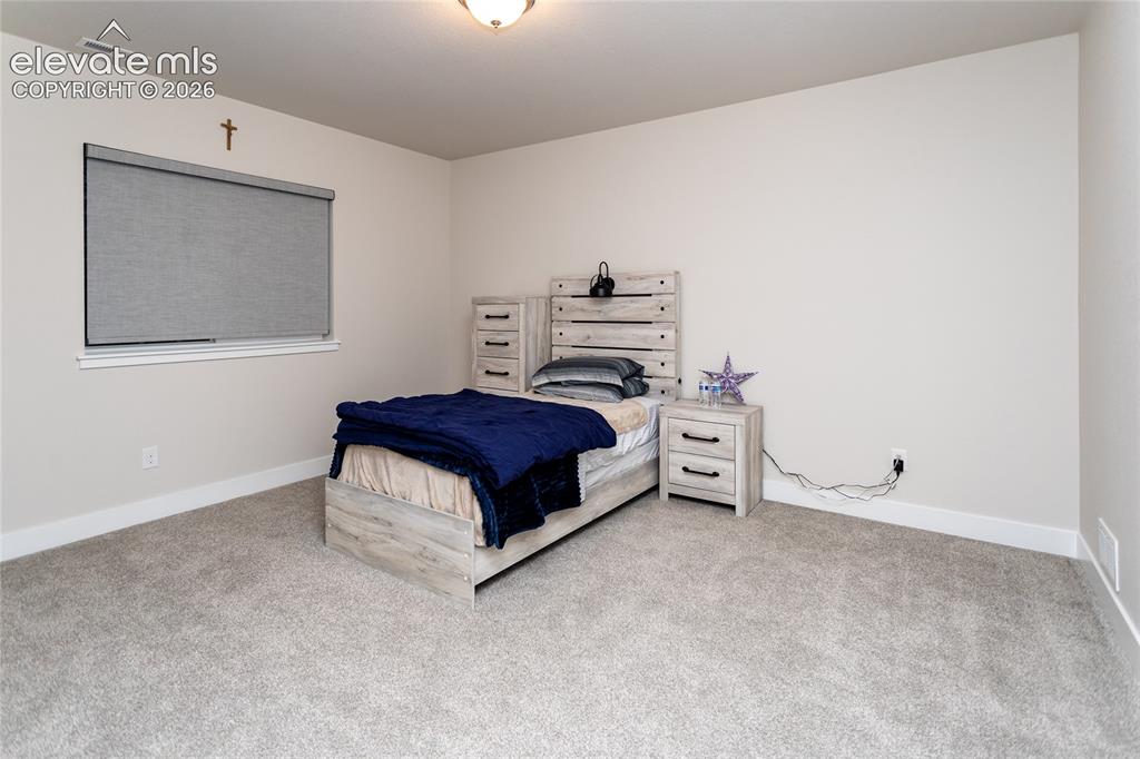 Image 46 of 50: Bedroom