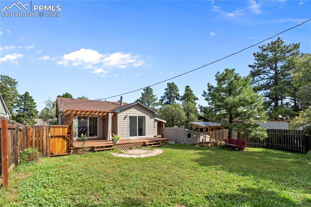 Image 27 of 37: Backyard with room for fun!