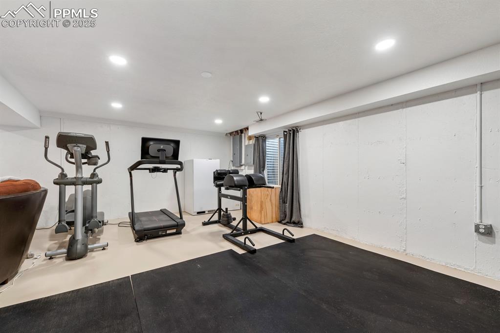 Image 23 of 39: Workout area with recessed lighting