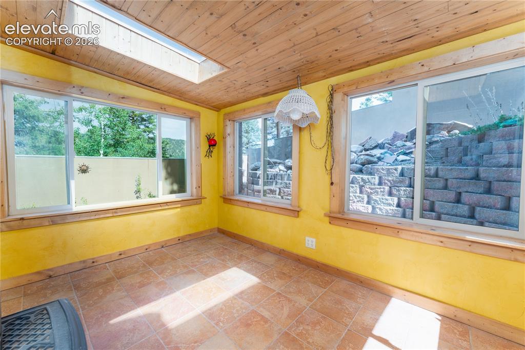 Image 10 of 27: Sun Room