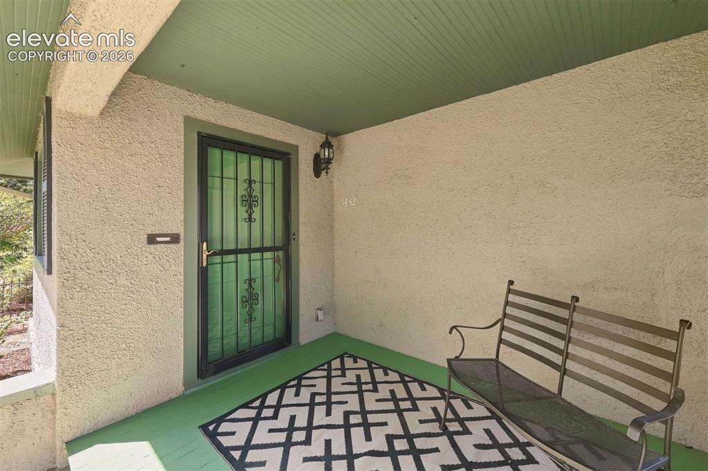 Image 11 of 36: Covered front porch