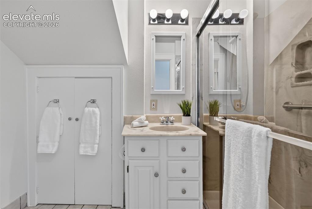 Image 17 of 36: 3/4 bathroom on the main level.