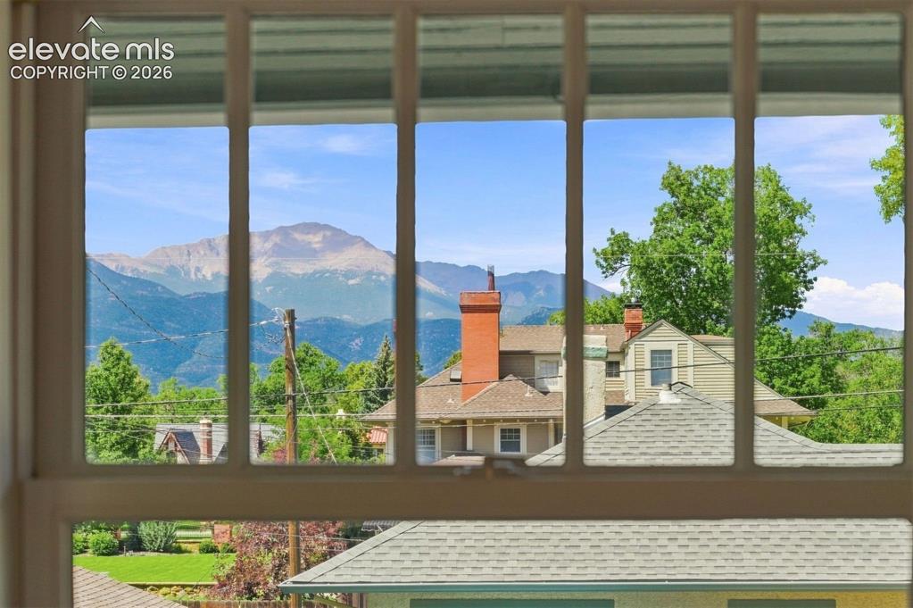 Image 8 of 36: Views of Pikes Peak from the hall bathroom.