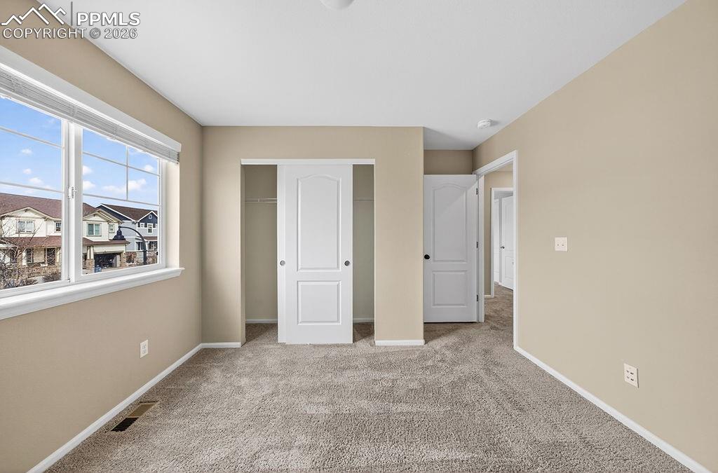 Image 20 of 45: Main floor bedroom