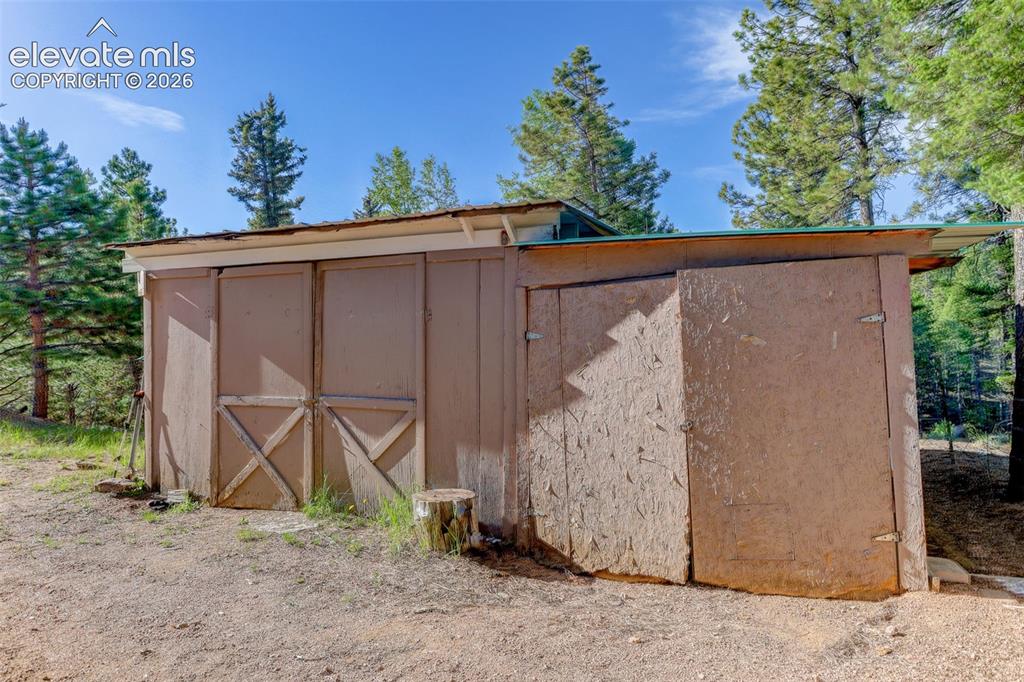 Image 20 of 39: Storage shed
