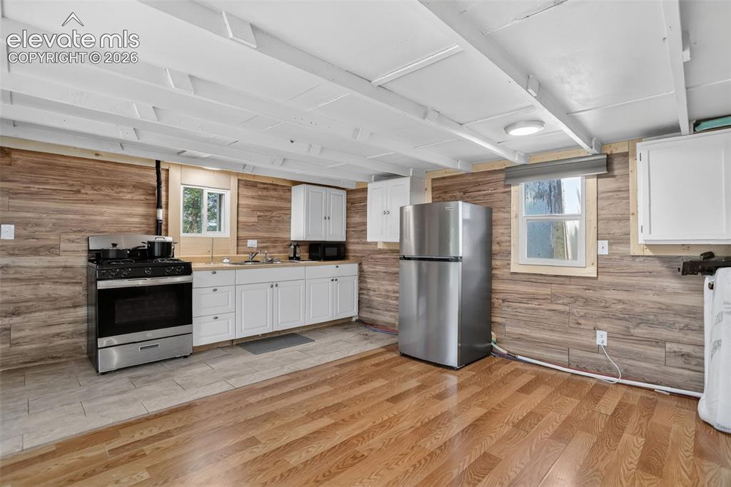 Image 8 of 39: Open kitchen with new sink