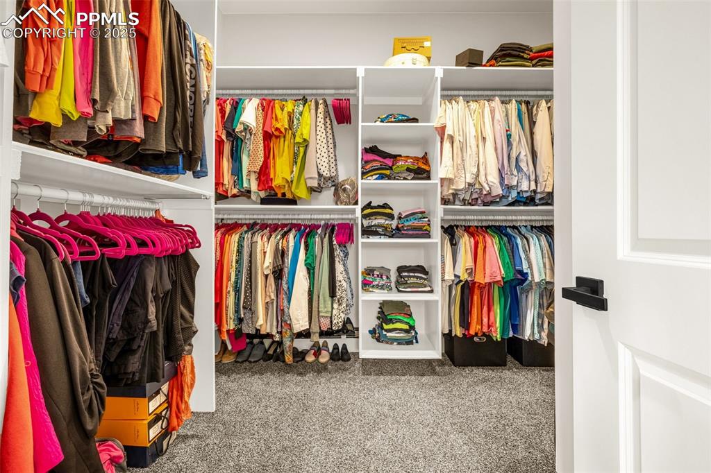 Image 14 of 35: Custom walk in closet