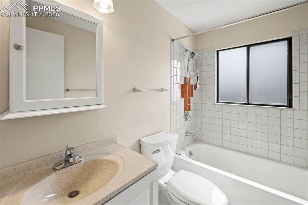 Image 29 of 50: Upstairs full bath