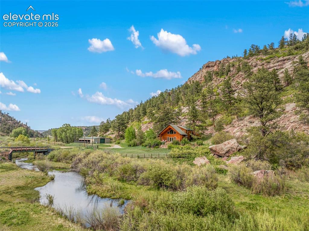 Image 1 of 42: Your dream country retreat starts here, with a tranquil stream and pictures