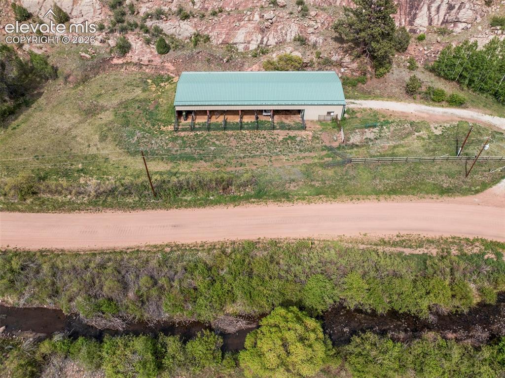 Image 9 of 42: 40x100 Barn with shop and tack room. 