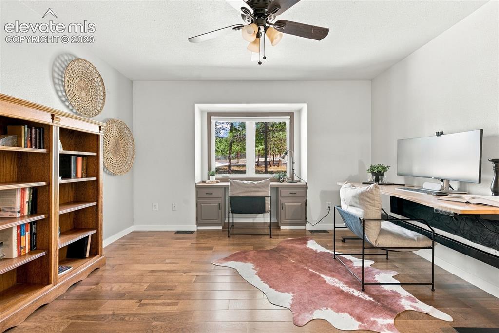 Image 17 of 37: Wood-finish flooring throughout