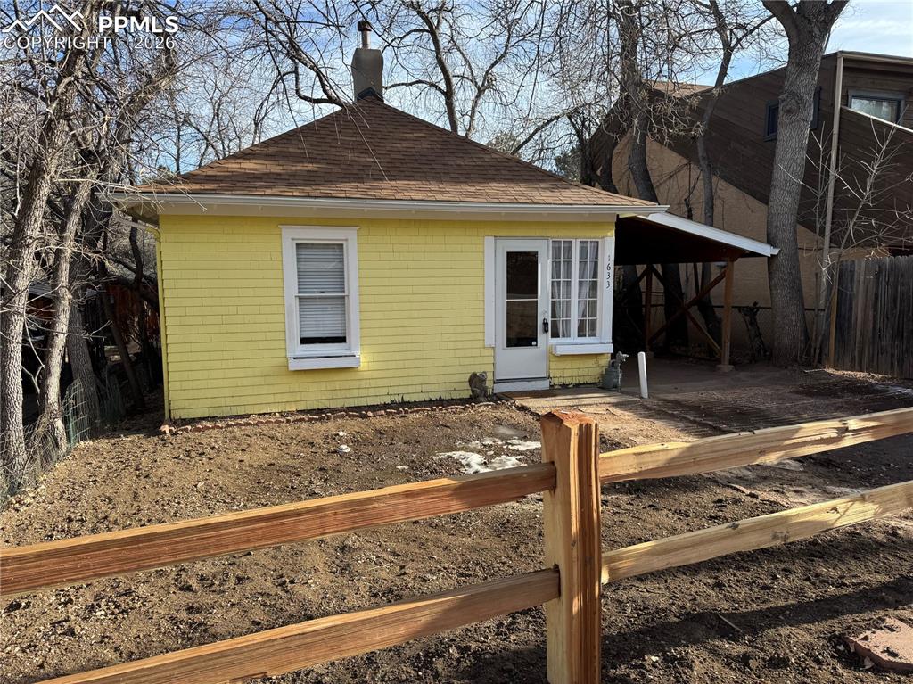 Caption: Rancher with a Carport