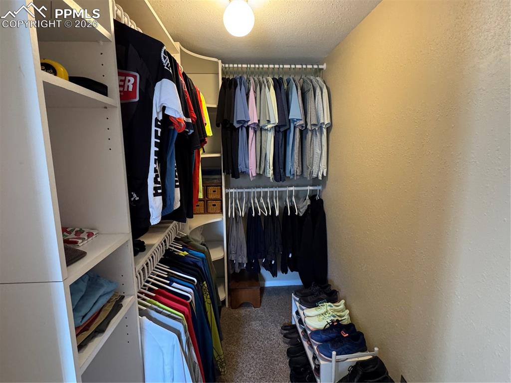 Image 14 of 22: Walk-In closet