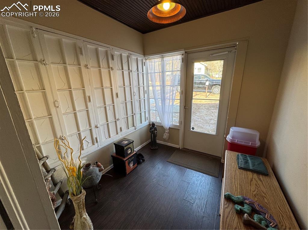 Image 3 of 22: Foyer Entrance Helps Keep the Home Warm