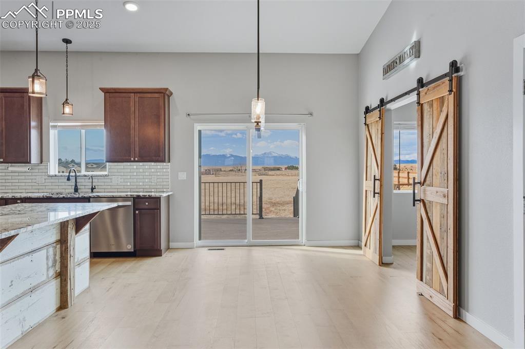 Image 14 of 50: View of Pikes Peak from your dining Room. 