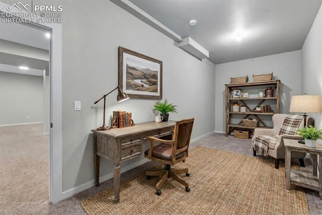 Image 38 of 50: Virtually Staged as an office.