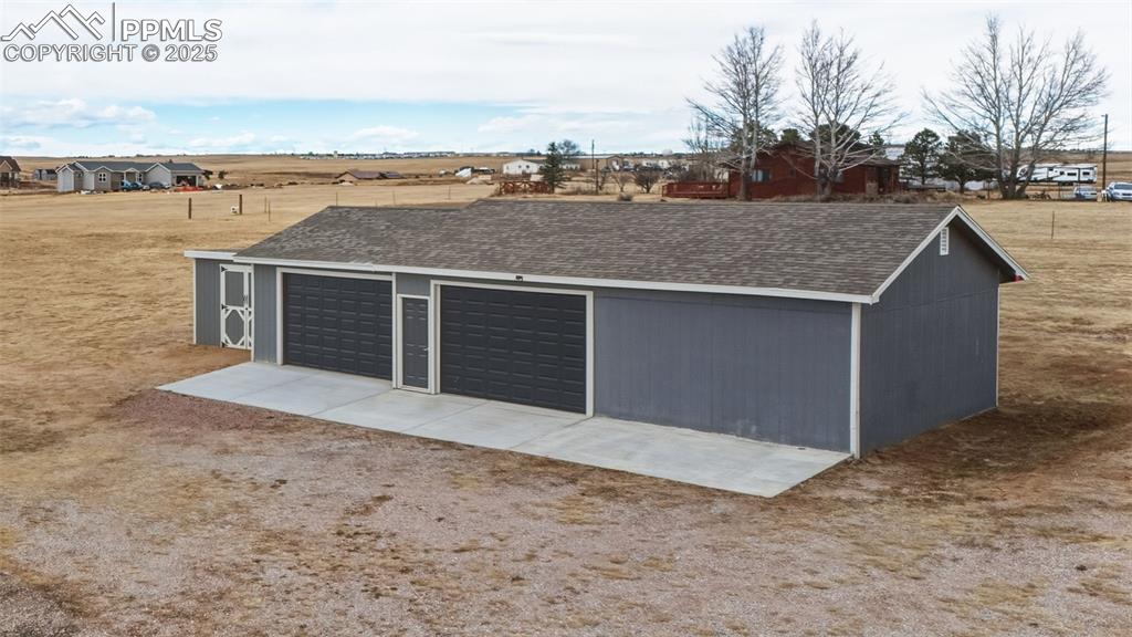 Image 43 of 50: Workshop or storage. You have so many options.