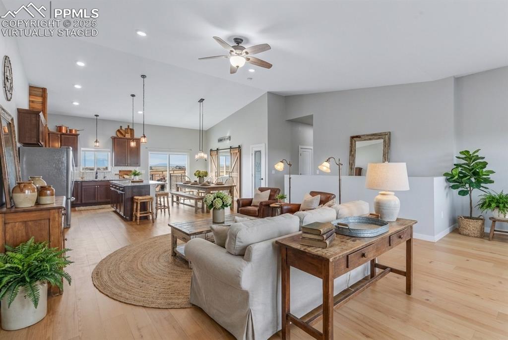 Image 5 of 50: Virtually Staged - Living Room main level.