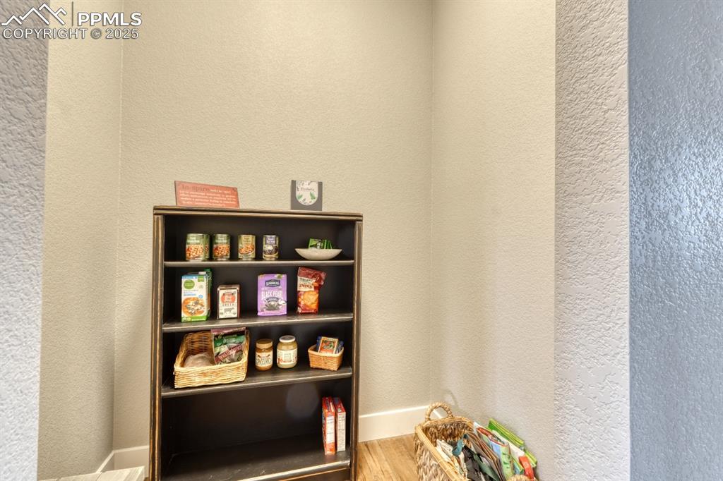 Image 12 of 46: Large walk in pantry