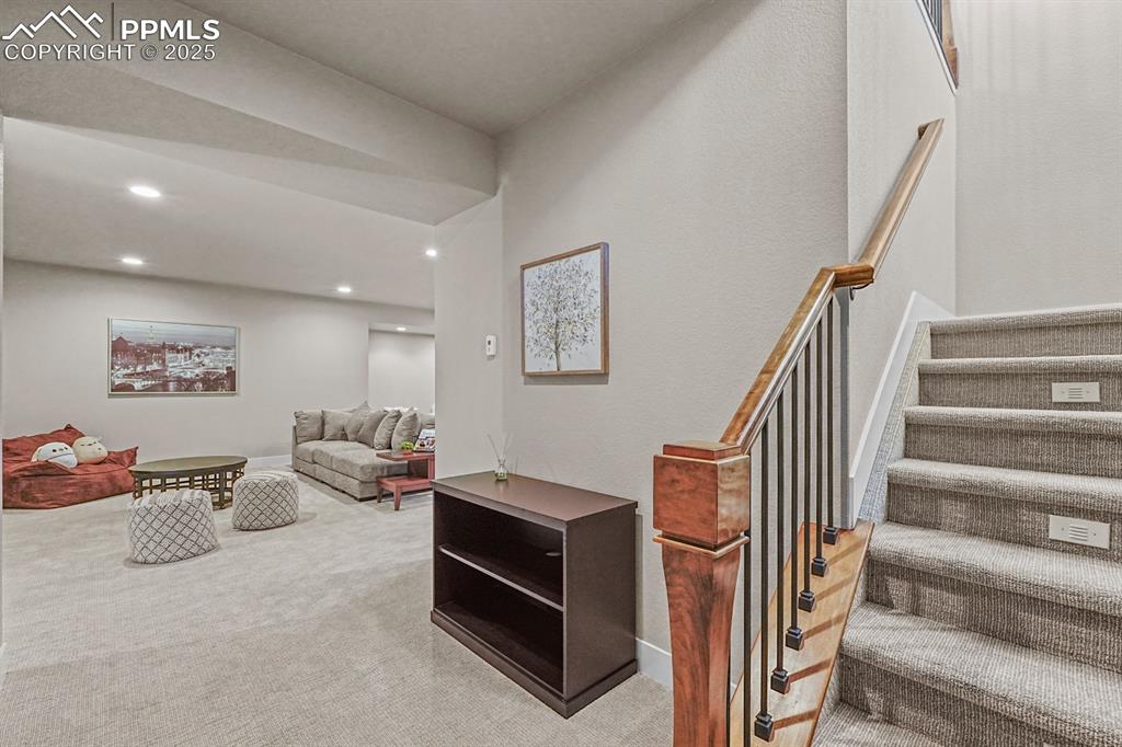 Image 26 of 46: Stairway to recreation room