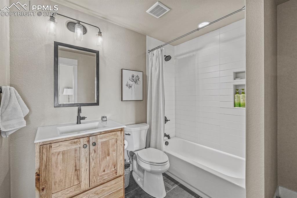 Image 29 of 46: Full bathroom with shower / bathtub combo
