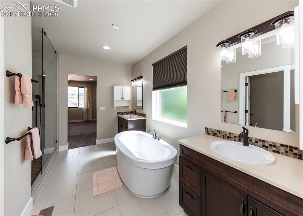 Image 21 of 39: Master Bathroom