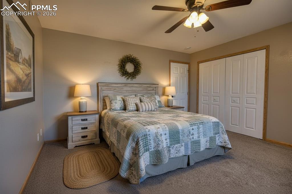 Image 12 of 27: Primary bedroom with country style
 virtual staging