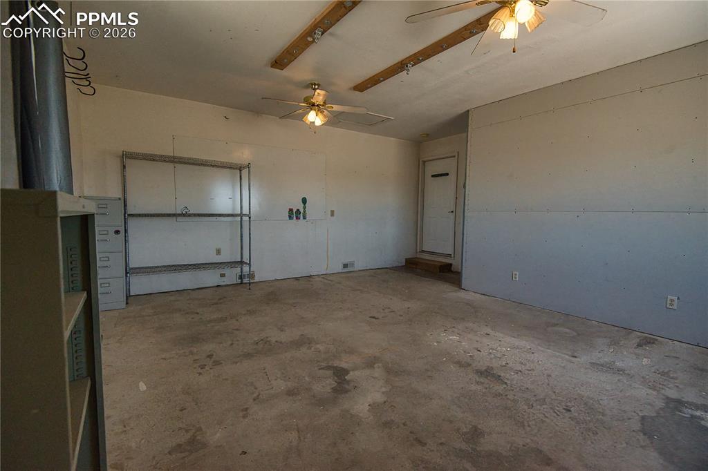 Image 20 of 27: Buyer may choose to convert this space back to a garage or into
more livin