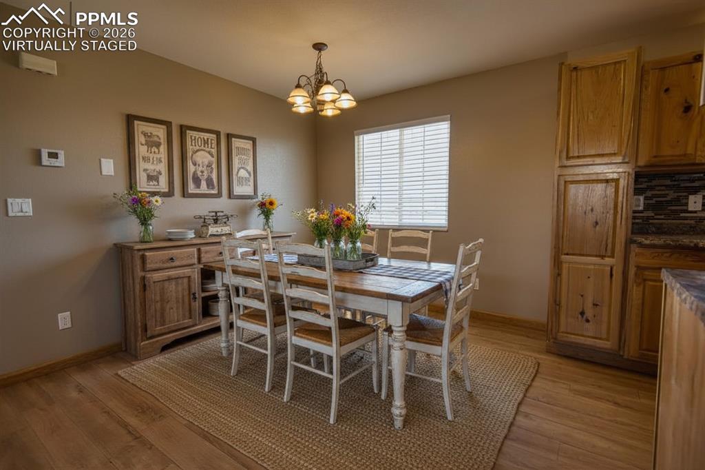 Image 7 of 27: Virtually staged country dining room
