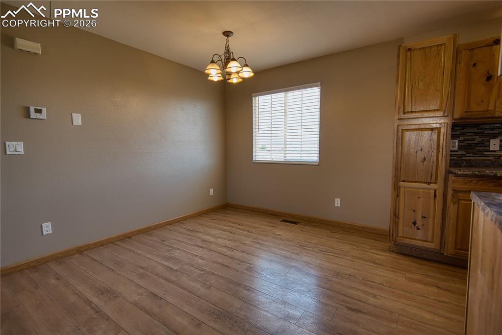 Image 8 of 27: Dining room without virtual staging
