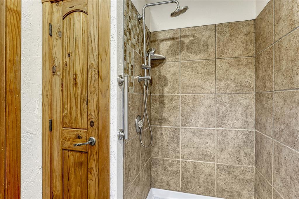 Image 14 of 49: Dog wash on main level