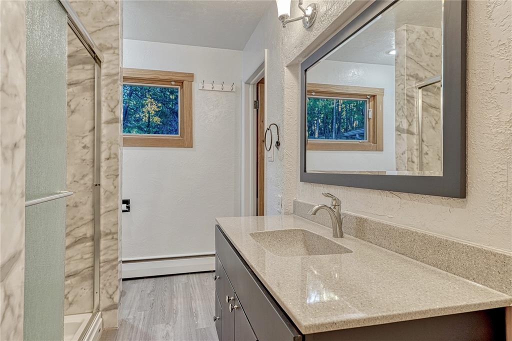 Image 21 of 49: 3/4 bath on main