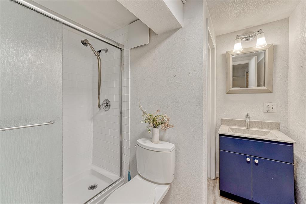 Image 26 of 49: 3/4 bath in basement