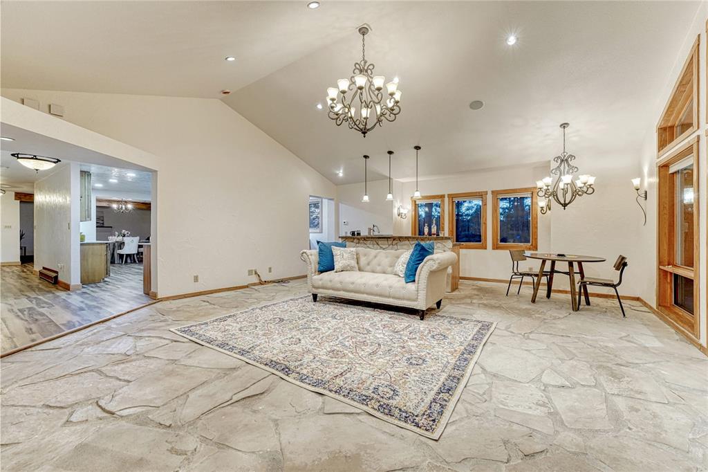 Image 4 of 49: Stone floors with radiant heat