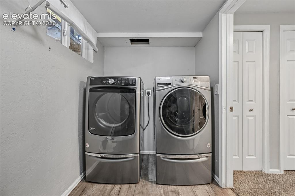Image 13 of 41: Laundry in basement