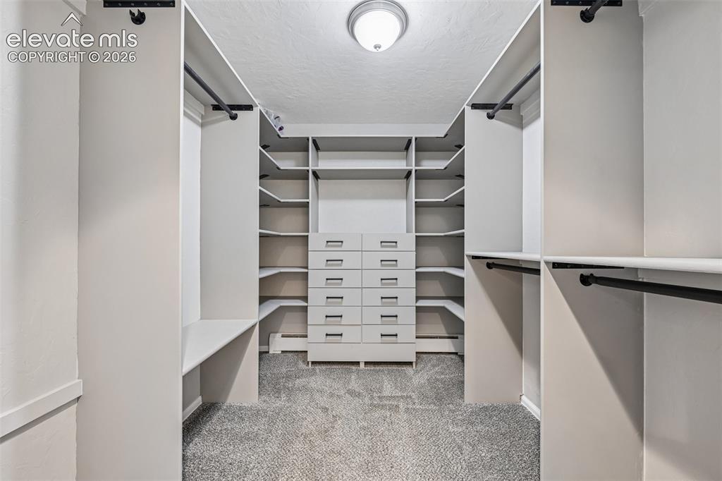Image 16 of 41: Primary walk in closet