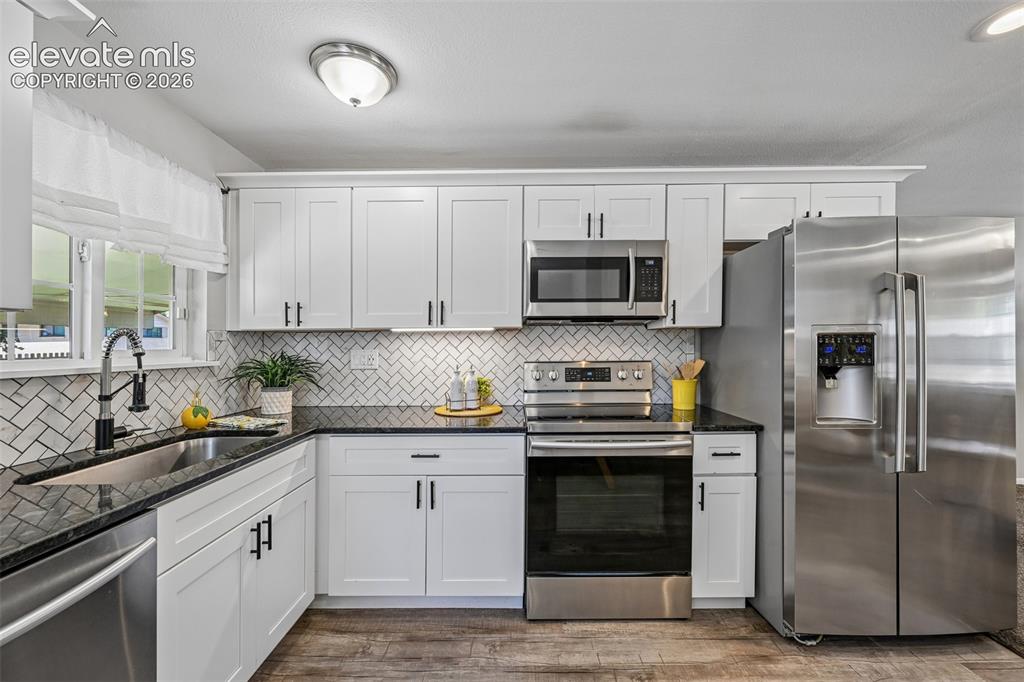 Image 33 of 41: Newer cabinets
