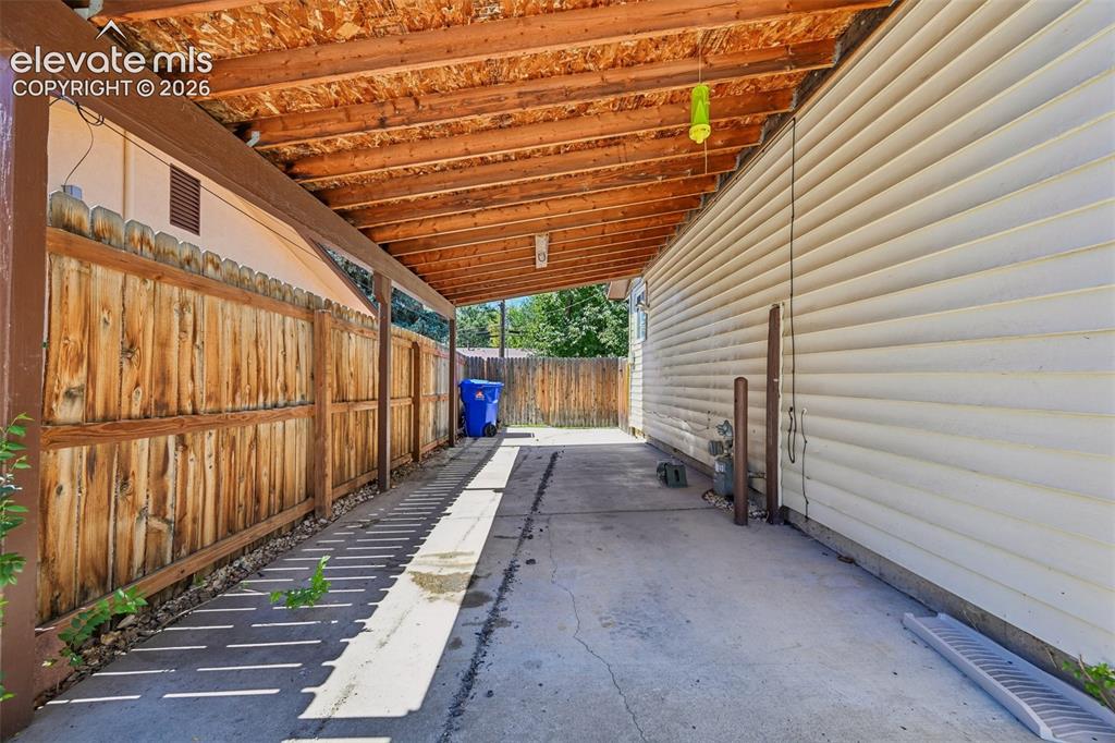 Image 6 of 41: Carport from driveway