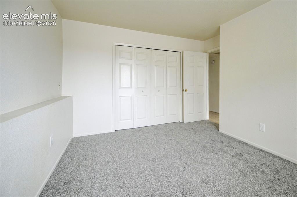 Image 10 of 14: Bedroom