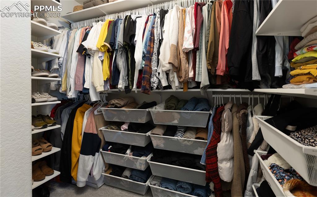 Image 12 of 34: Large walk-in closet