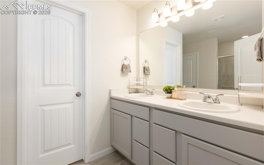 Image 13 of 34: Primary bath with water closet