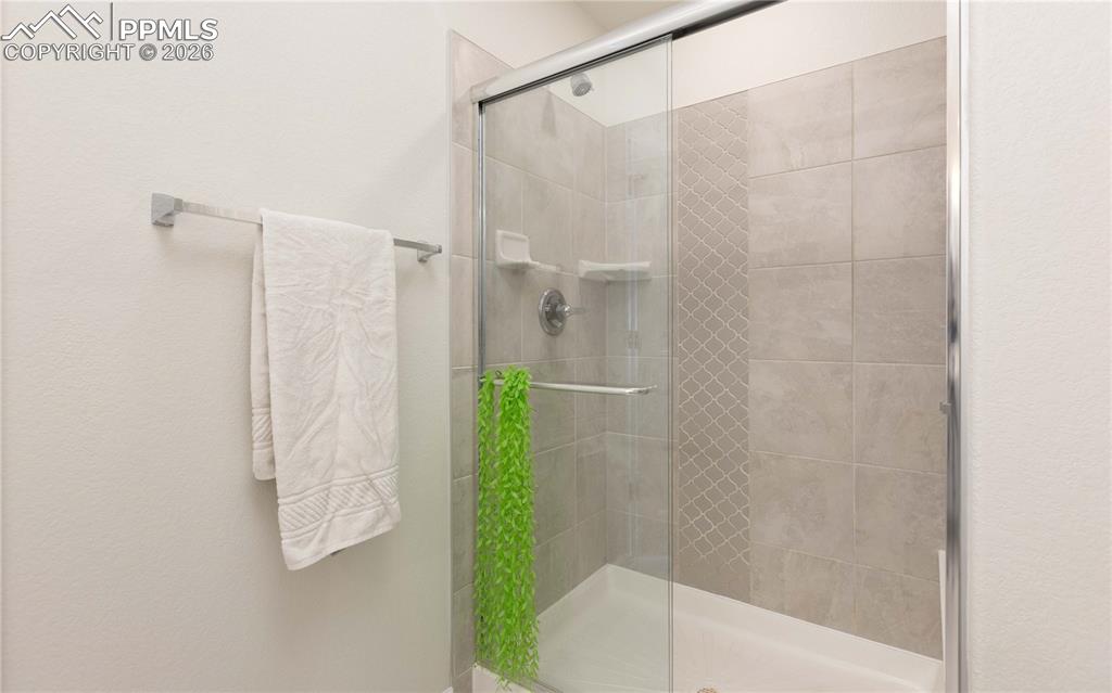 Image 14 of 34: Walk-in shower