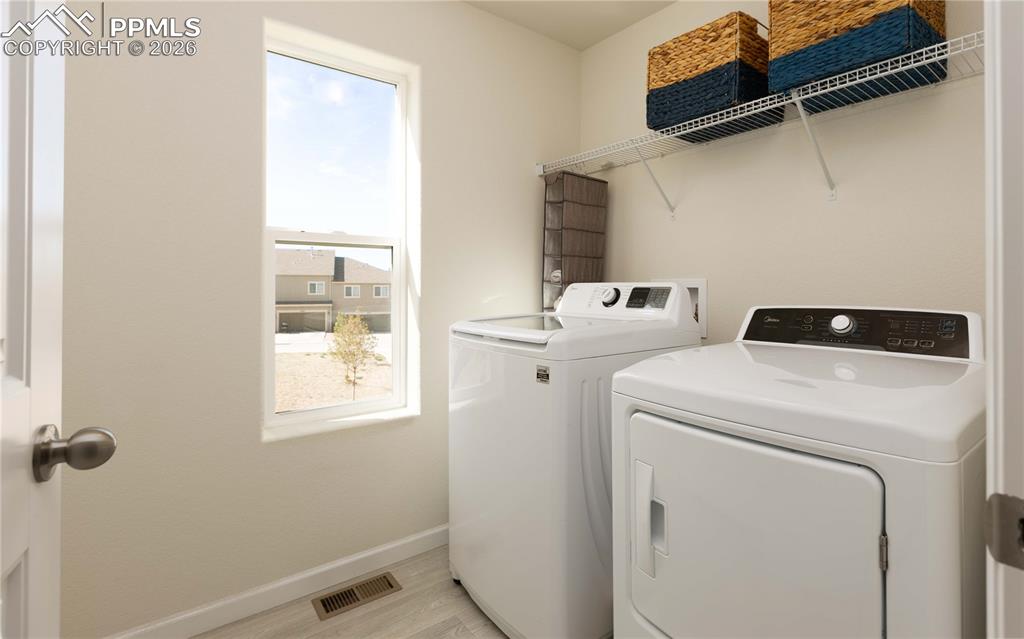 Image 15 of 34: Upper level laundry area