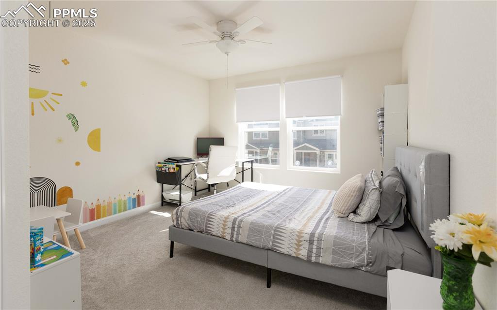 Image 16 of 34: Bedroom 2 facing the courtyard