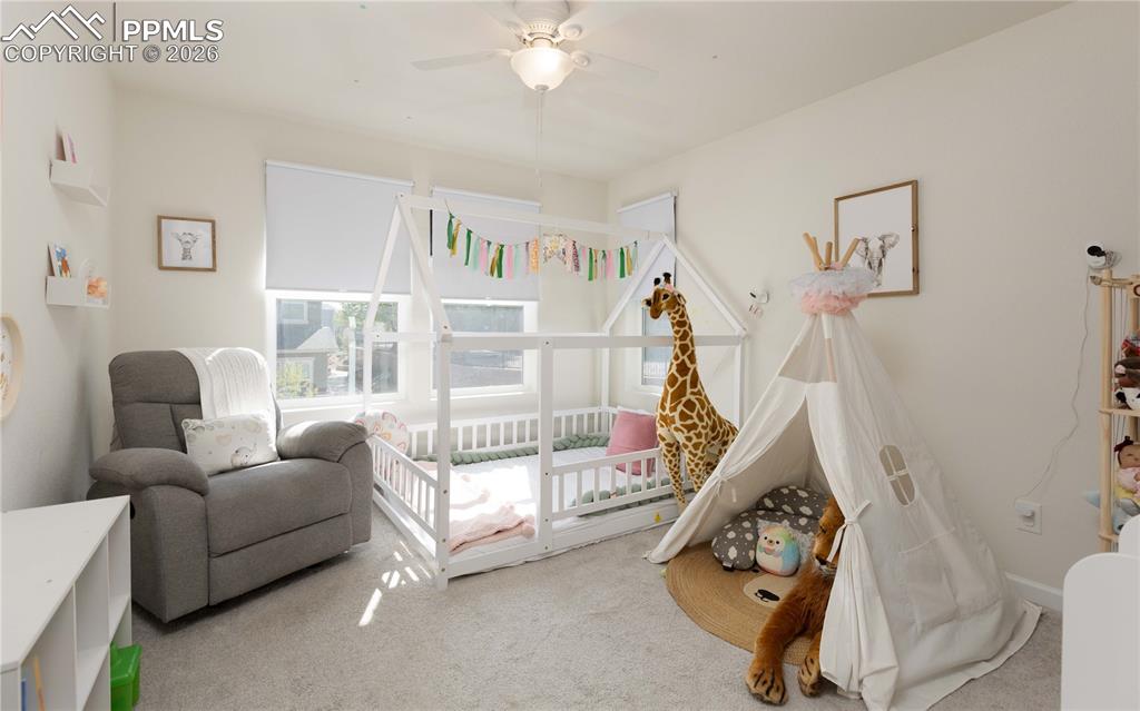 Image 17 of 34: Bedroom 3 facing the courtyard