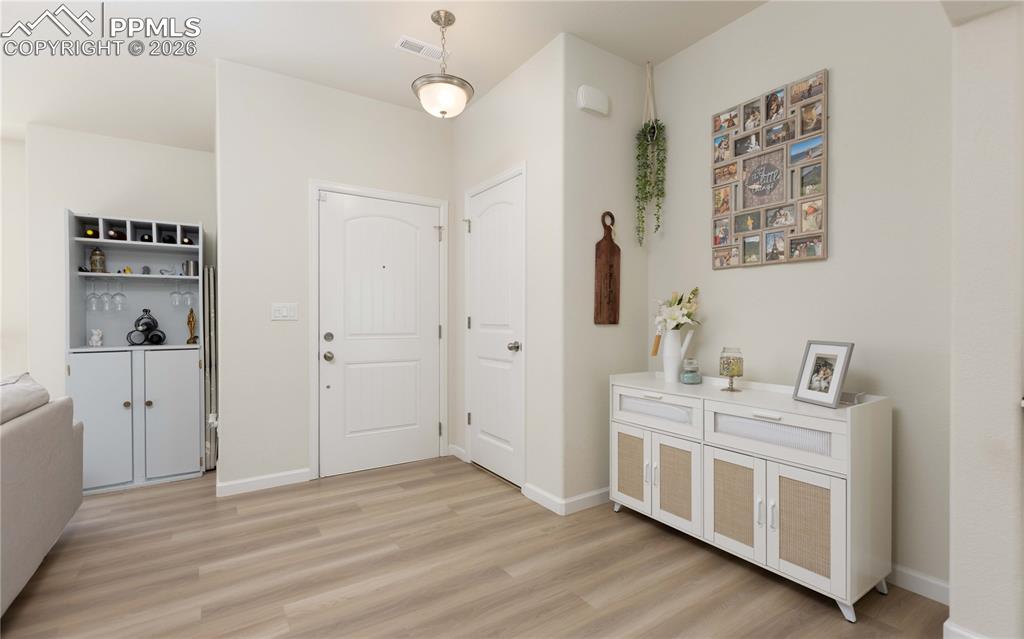 Image 20 of 34: Front coat closet and ample entry space