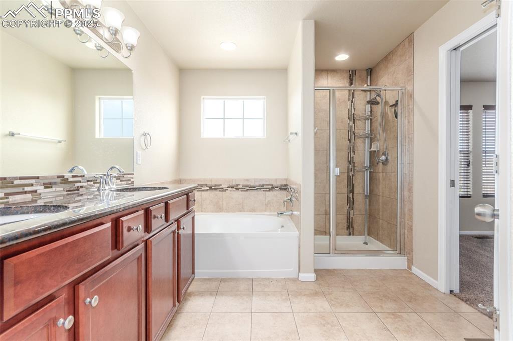 Image 16 of 50: Master Bathroom