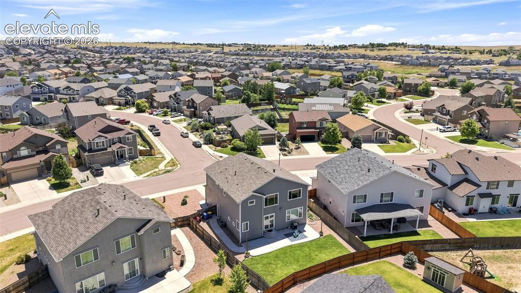 Image 46 of 50: Aerial perspective showcasing a residential neighborhood with varied archit